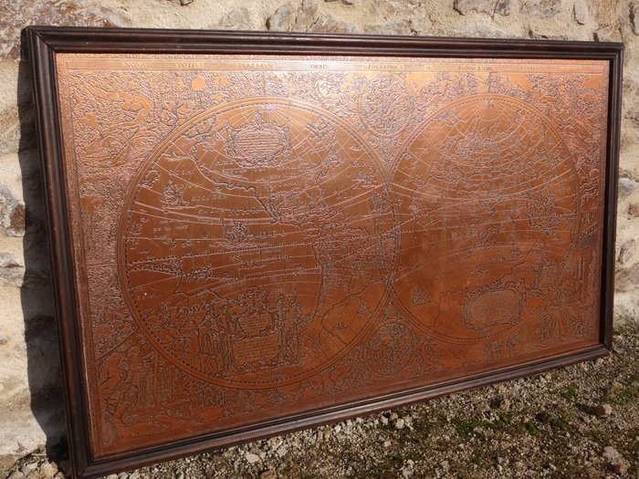 Large map of the world in copper. Text in Latin “Nova - Totius - Terrarum - Arbis - Geographica”. AC Hydrographica Tabula.   The original was created by Hendrik Hondius in 1641.  On the left half, we can see North & South America, New Guinea.