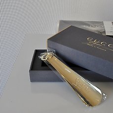 Gucci Italy – 2 gold-plated metal shoe 