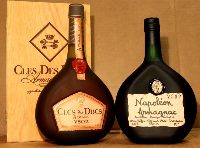 2 bottles of Armagnac: 1. Cles des Ducs VSOP Armagnac with OWC & 2. Marie Duffau Napoleon Armagnac 