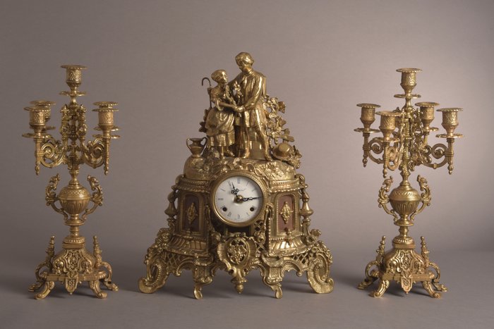 Bronze Imperial clock with matching candlesticks - Italy - with German timepiece, movement - half of the 20th century