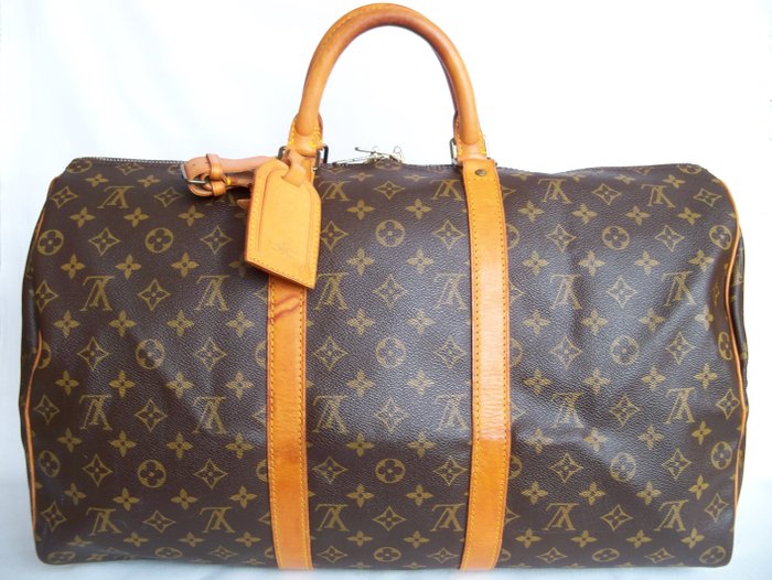 Louis Vuitton - Keepall 50 handbag + LV Accessories -*No Minimum Price* - Catawiki