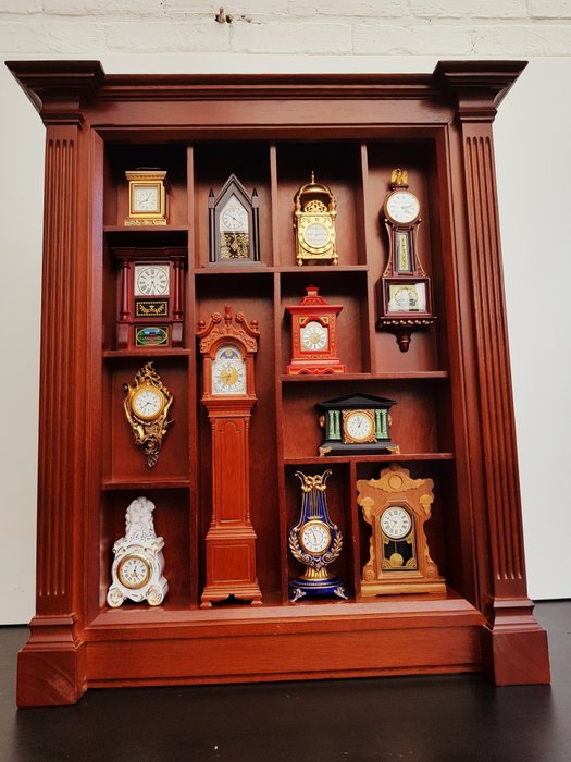 Miniature Clock Collection of 12 clocks in Mahogany cabinet - Franklin Mint 