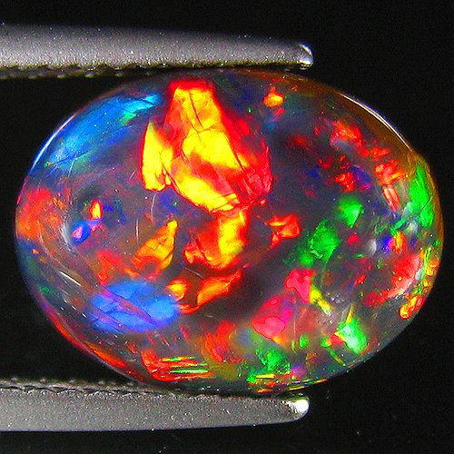 excellent black opal with rainbow flash - 12.4 x 9.6 x 5.6 mm 4.15 ct ...
