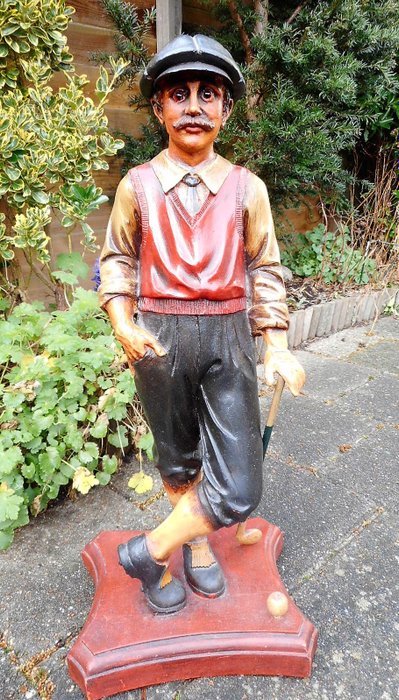 Golf - wooden statue of golf player