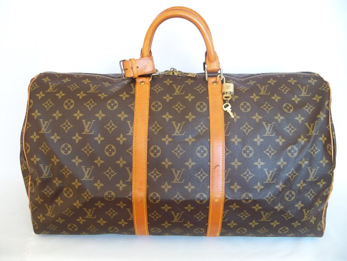 Louis Vuitton - Keepall 55 Luggage bag + LV Padlock 313 -*No Reserve Price!* - Vintage - Catawiki