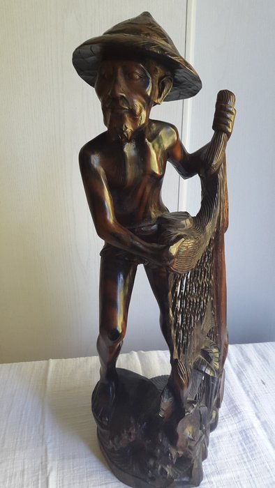 Coromandel wooden statue of a fisherman - Bali - Indonesia - 2nd half 20th century