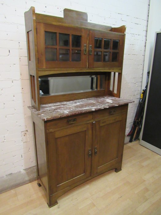 A Kitchen Cabinet With Cut Glass And Marble Top Nut Catawiki