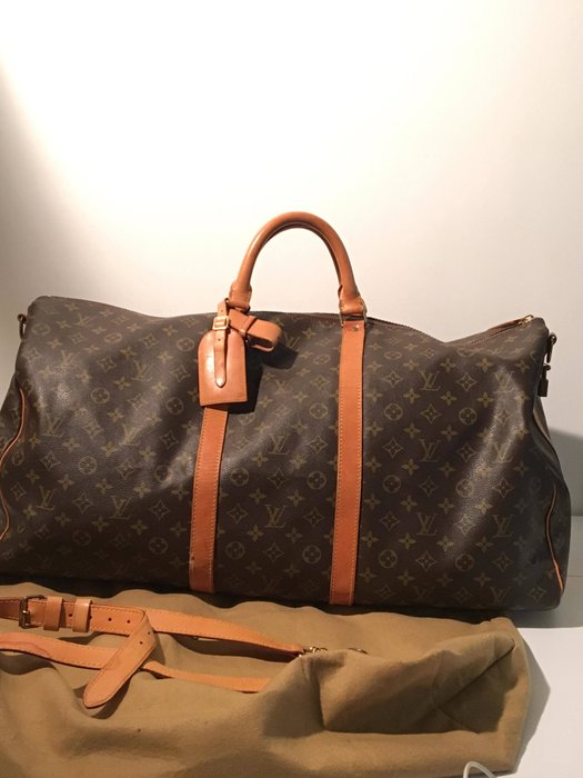 Louis Vuitton – Keepall 60 travel bag with shoulder strap - Catawiki