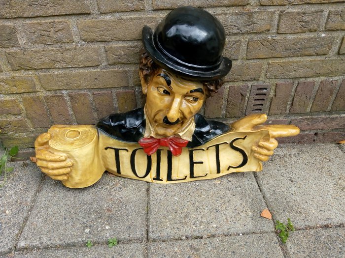 Charlie Chaplin toilet sign