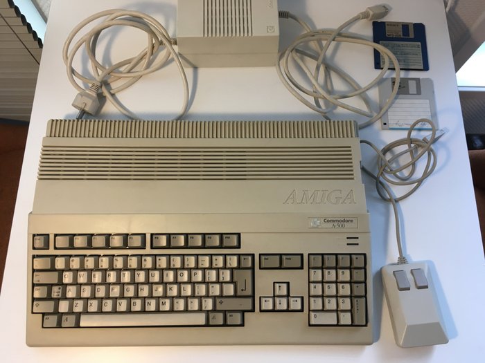 Commodore Amiga 500, including power pack and mouse.
