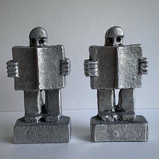 Willy Ceysens - Un par de sujetalibros de aluminio macizo.