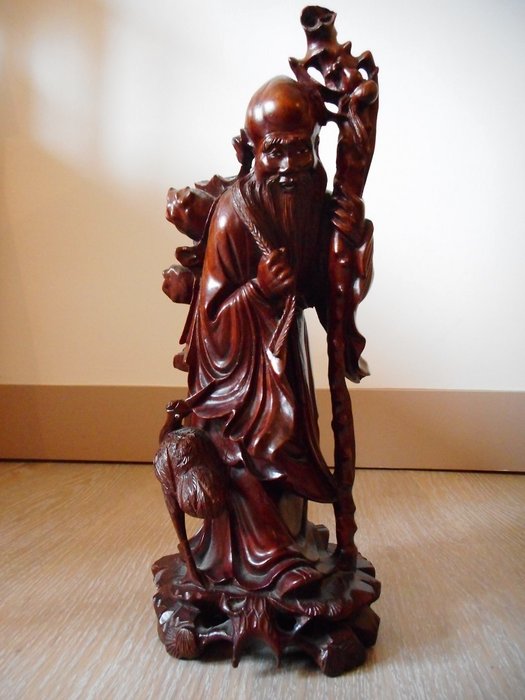 Wooden Chinese sculpture depicting an immortal - China - early 1910s - 1920s