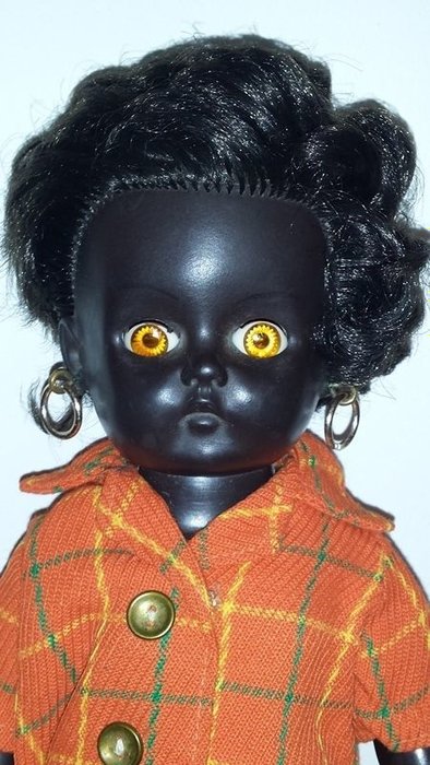Vintage Hard Plastic and Rubber Black Doll with Orange Color Eyes pedigree