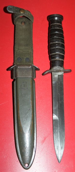U.S. M3 Fighting knife by Imperial, in very good condtion, with markings and ordonance stamp, M8 scabbard from B.M. Co.