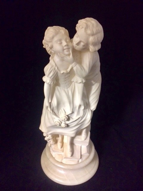 Prof. Giuseppe Bessi - Stonelite sculpture of a girl and boy on marble base