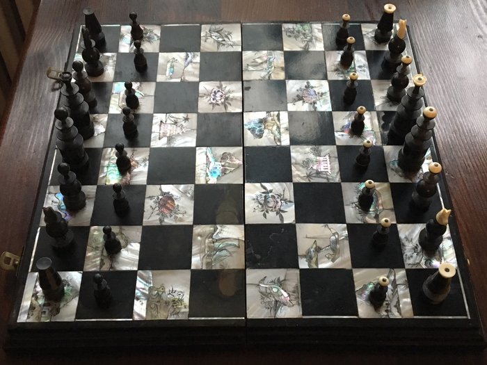 Chinese chess board with inlaid mother of pearl, figurines made of carved horn