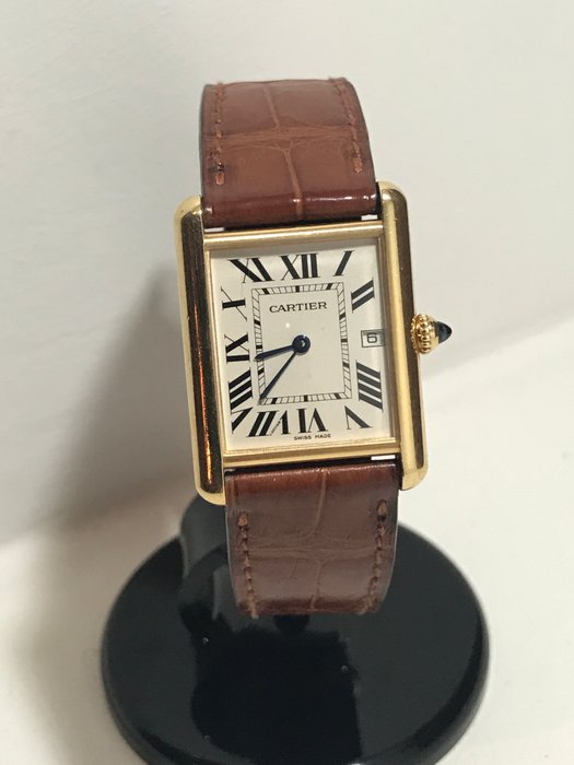 cartier tank watch with date