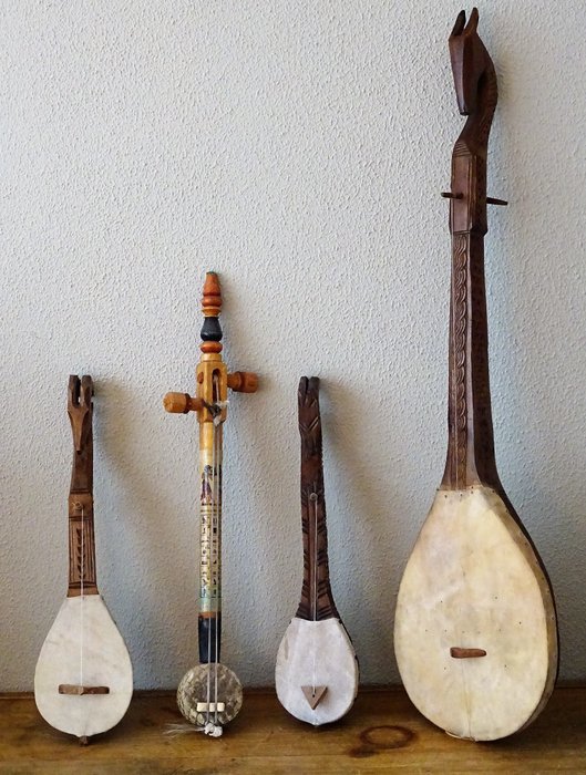 4 decorative African string instruments