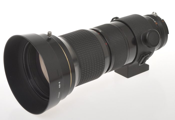 Nikon, beautiful and rare zoom 50-300mm F:4.5 Nikkor ED AIs with caps