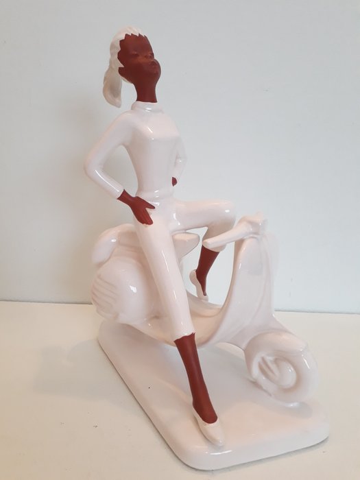 Jema Holland - lady on scooter