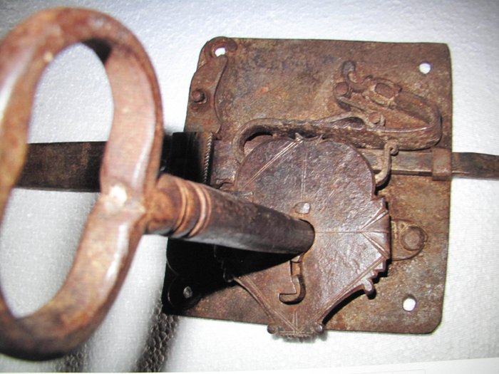 very old lock with its key of origin in wrought iron, 17th /18th centuries