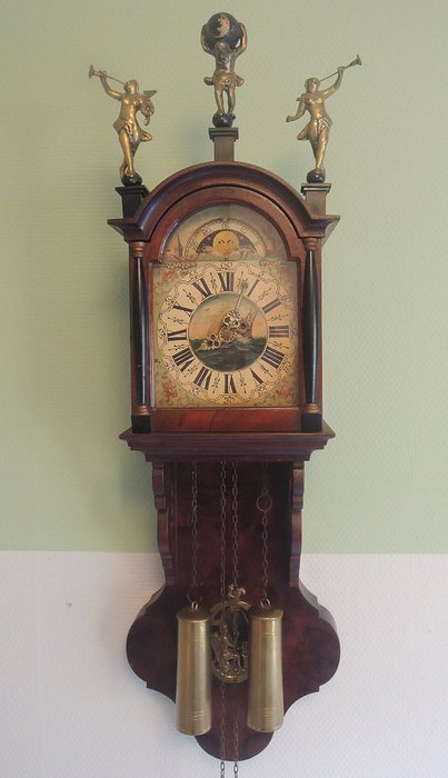 Frisian tail clock with moon phase and Atlas and Faam statues