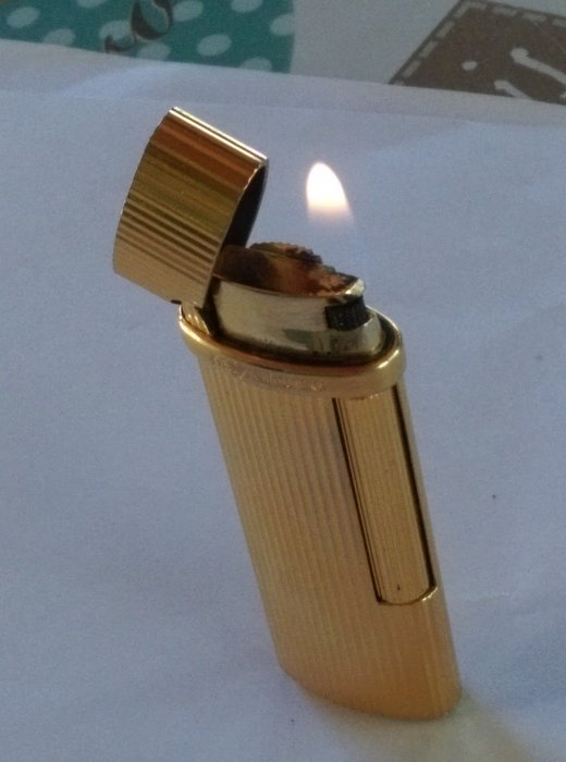 Yves Saint-Laurent lighter in working condition