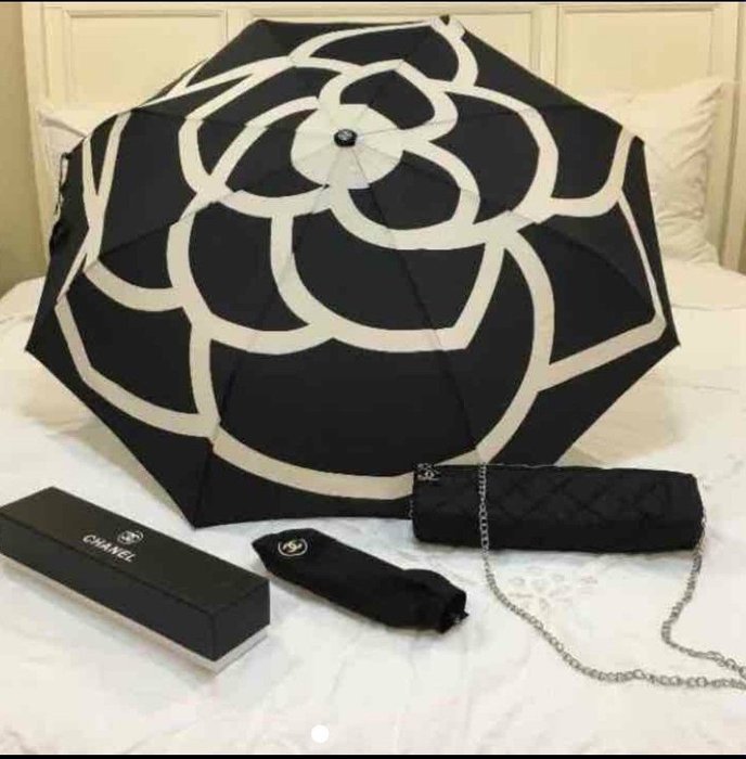 Chanel - Black-Camellia Umbrella with carry bag - Catawiki
