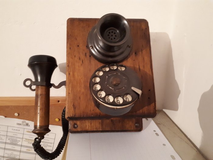 Old phone with a cone receiver.