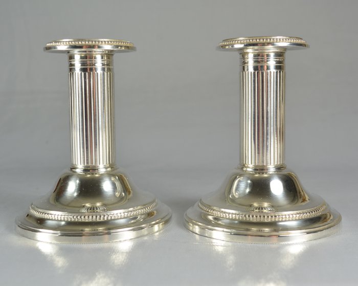 Pair of Sterling Silver candlesticks, master silversmith Odiot, France, early 20th century