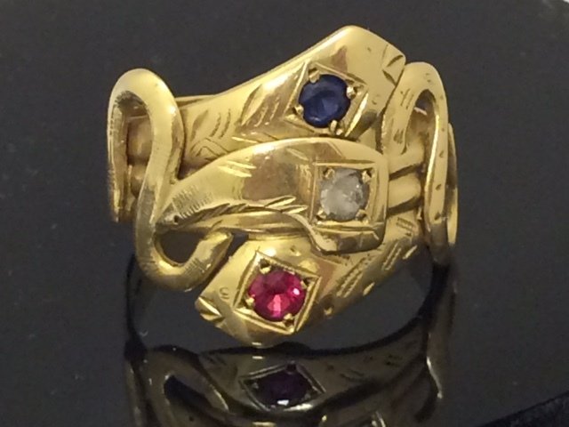 Gold snake ring with ruby, sapphire and rock crystal - ring size 21.5 mm