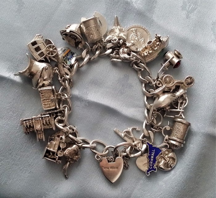 "sterling silver gold charm bracelet charms"