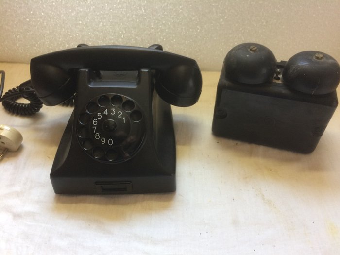 A black old Bakelite phone - PTT with old Bakelite double bell from 1961