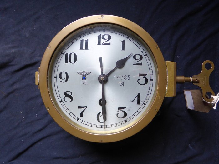 A German u-boat clock / Kriegs Marine u-boat clock made by Kieninger & Obergfell. WWII, in a very nice and good condition!