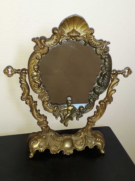 Mirror on old foot in bronze 1900-1950