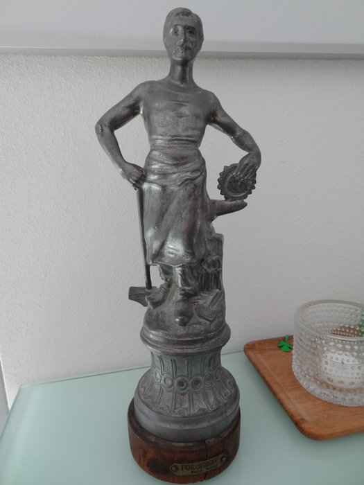 A. Rucho sculpture - blacksmith / Forgeron  - approx. 1925 - material probably pewter / zink cast  - wooden base