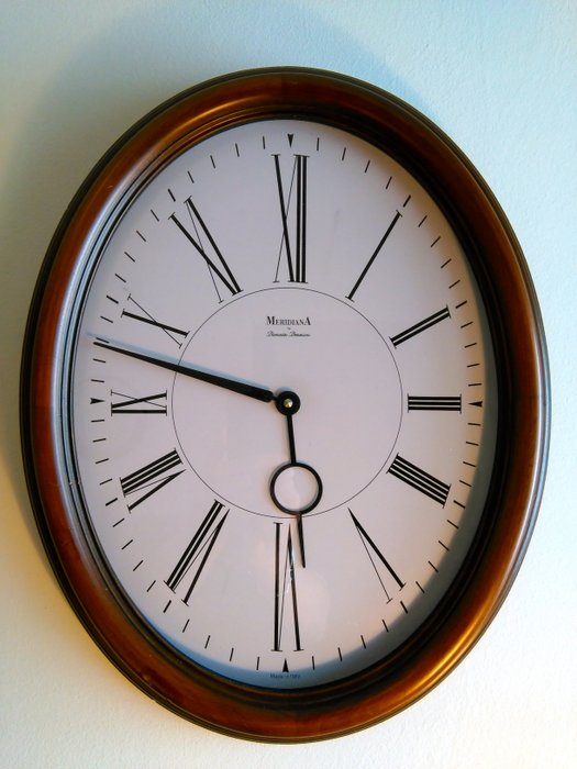 Diamantini Domeniconi - Elegant wall clock with oval frame in walnut wood - Meridiana