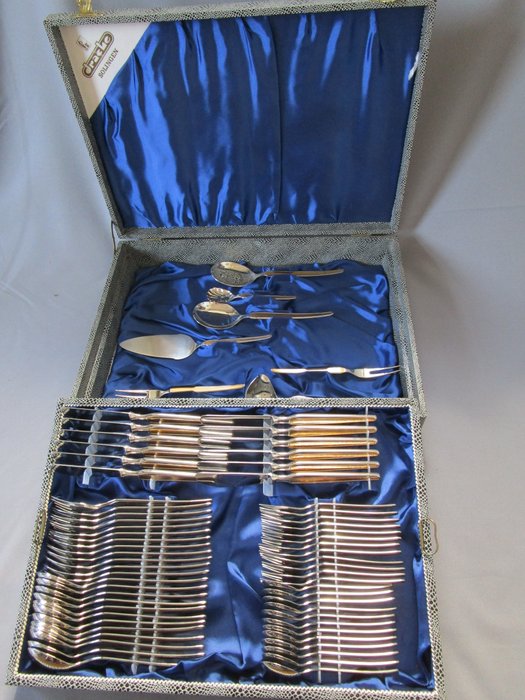 Cutlery by the manufacturer “Drache” - Series: LUXADOR - Partial gold plating - Solingen, Germany - For 12 people - 67 pieces in original cutlery case - unused!!