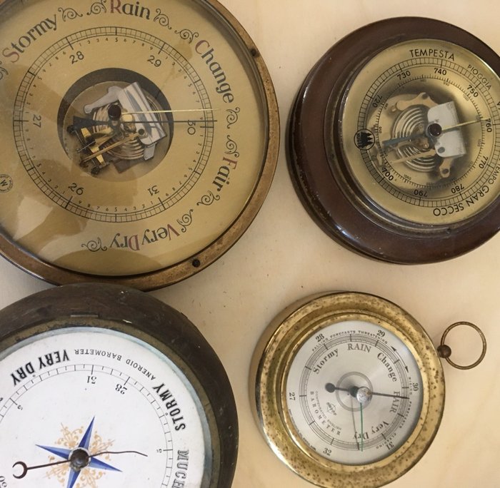 Four vintage barometers: Swift Inc. U.S. - Huger W. Germany - West Wood - Aneroid Barometer