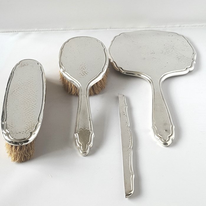 The Netherlands silver plated antique 4 pieced dressing table set, dd 90 met dolphin silver hallmark, 1859 - 1893, silver below 833/1000,