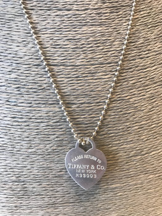 Tiffany long necklace with 'Please return to Tiffany & Co.' heart