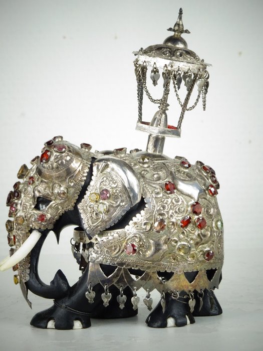 A silver plated, gemstone and ebony figure of an ornamented elephant - Kandy, Sri Lanka - circa 1930