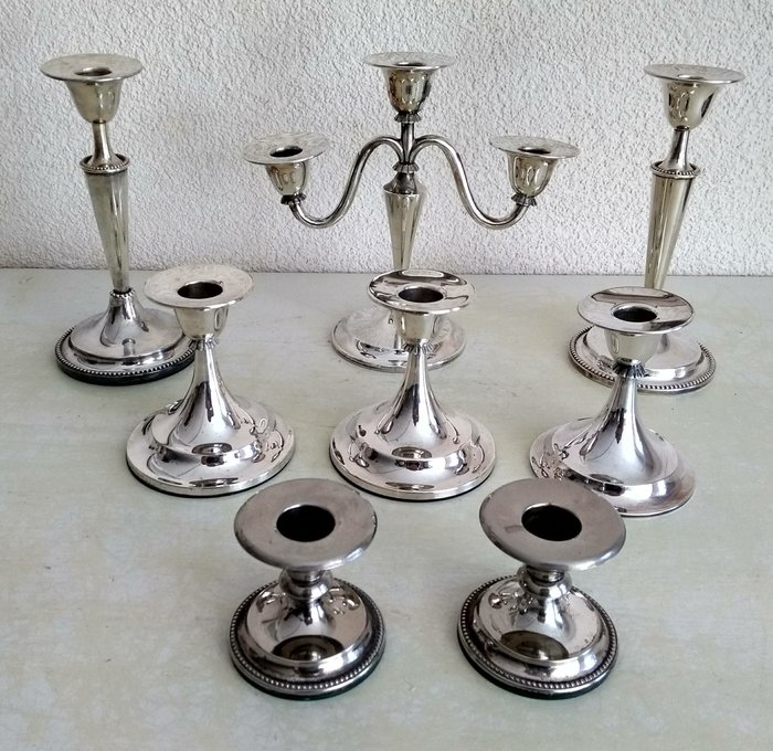 Eight silver plated Koninklijk Begeer and Keltum candle stands