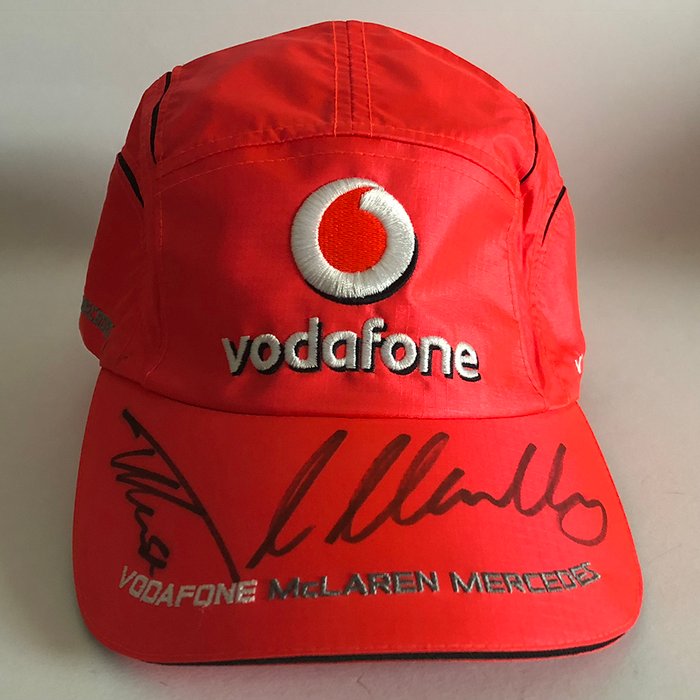 Lewis Hamilton and Fernando Alonso signed Vodafone McLaren Mercedes team cap