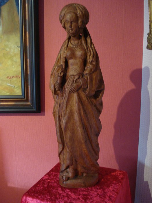 A large wooden sculpture of the Holy Mary Magdalene after Jan Borman - France - 1st half 20th century