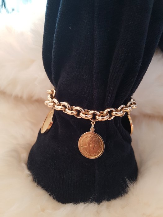 Gold bracelet with 1 gold five-euro coin and 2 gold ten-euro coins. 21 cm