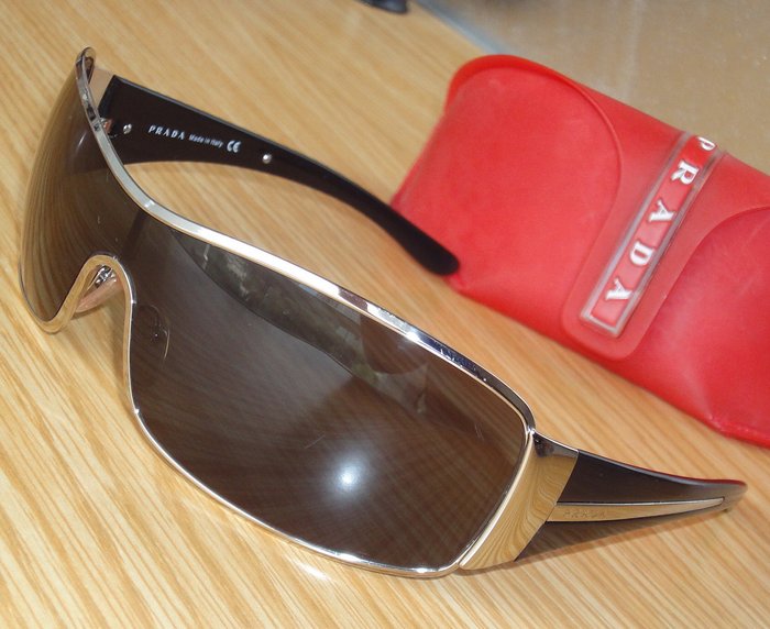 Prada - SPR 53H 1BC-1A1 115 3N Sunglasses