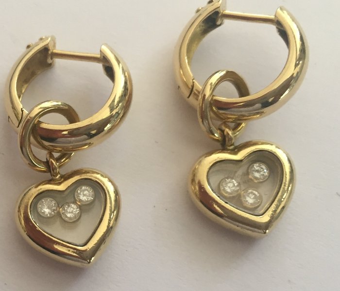 Chopard - A pair of yellow gold heart earrings, Happy Diamond.
