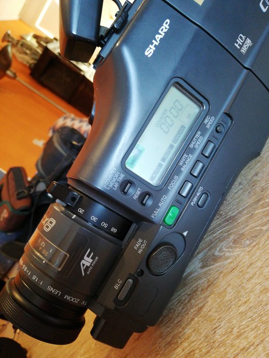 Sharp  video camera C670 HQ VHS C zoom 8