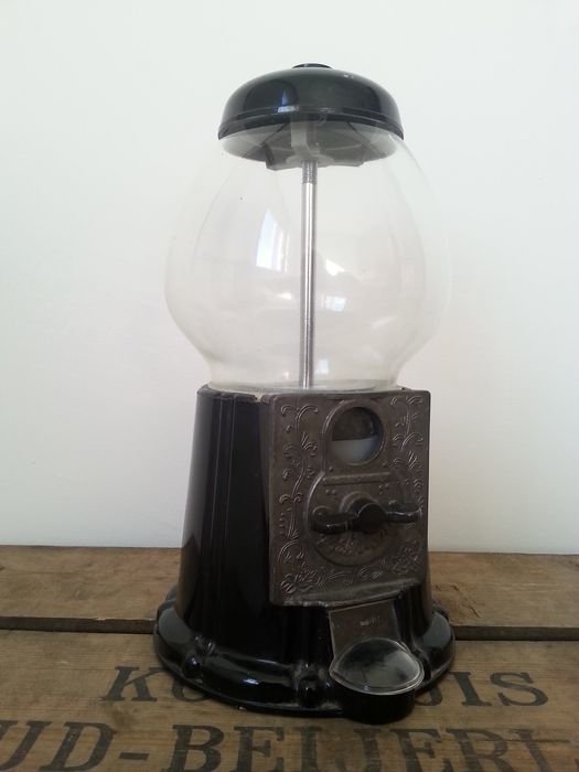 Very nice vintage black gumball machine, precise age unknown